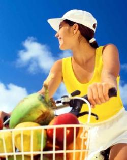 fruit in bike basket - Photo by Sun Star